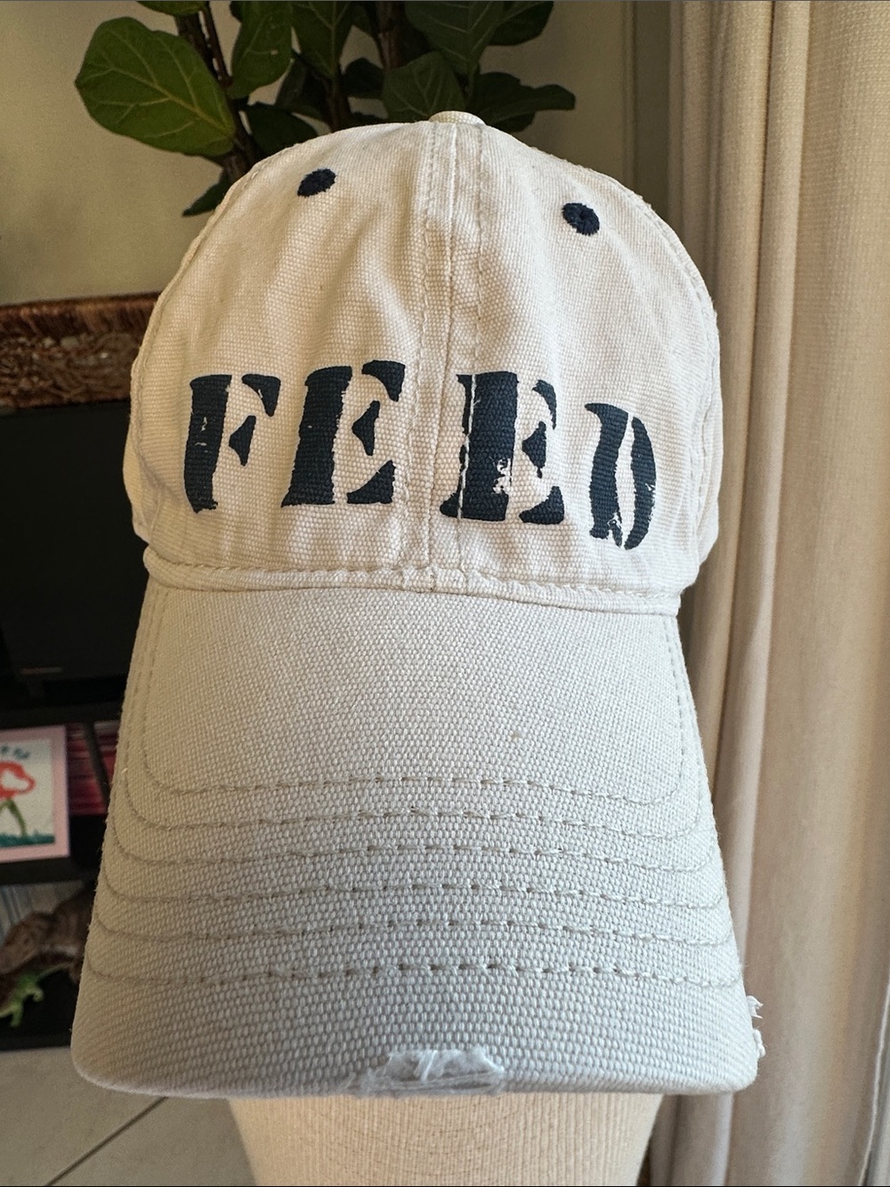 FEED Distressed Baseball Cap - Cream with Blue Graphic - Adjustable Strapback
